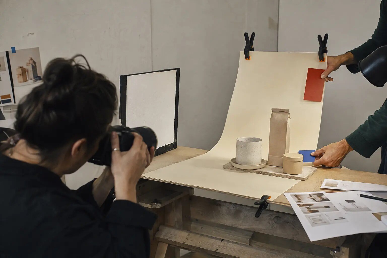 A small creative team producing branded digital content in a studio